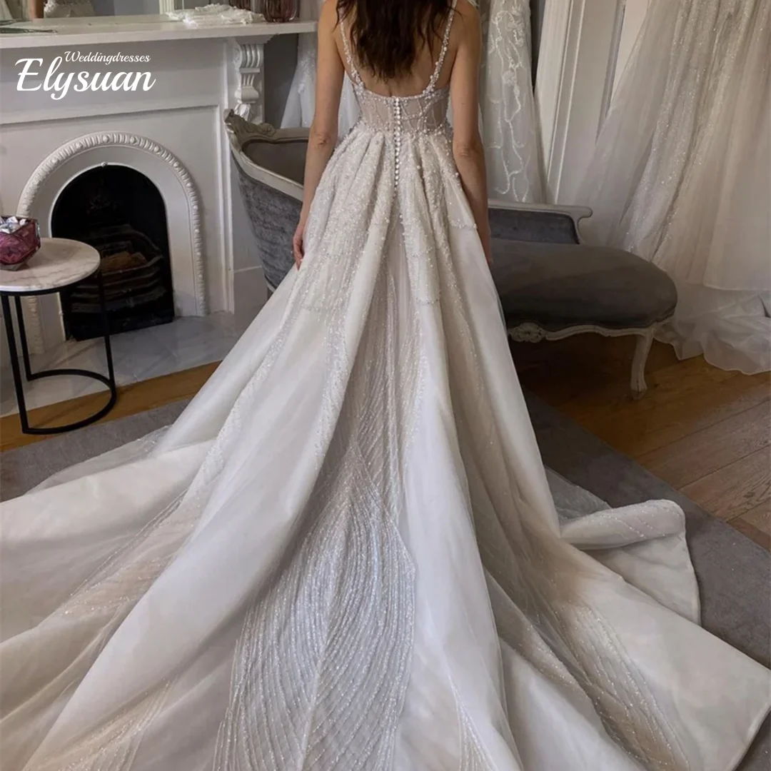 Maßgeschneiderte trägerlose Brautkleider Charmante ärmellose Kleider Elegantes bodenlanges Kleid mit Pailletten Vestidos De Novia