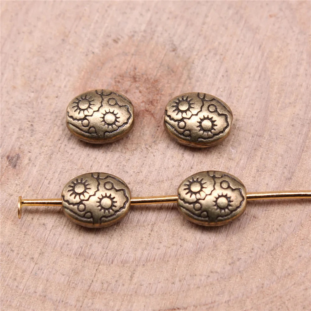 50pcs 7x6x3mm Alloy Charm Sun oval Small Hole Bead Finding ef5108