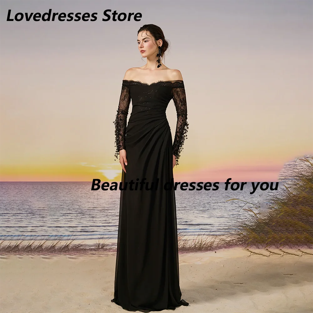 Vestido de fiesta negro personalizado con hombros descubiertos, mangas largas, adornos de flores, pliegues de gasa, corte en A, largo hasta el suelo