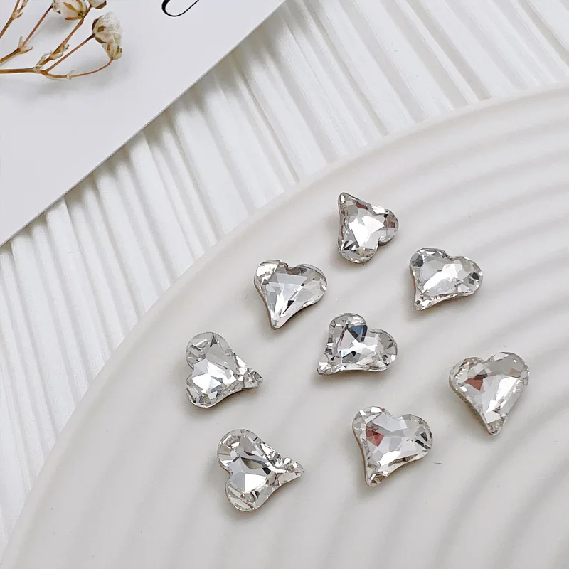 40 piezas de cuyas decoraciones para uñas con forma de corazón torcido