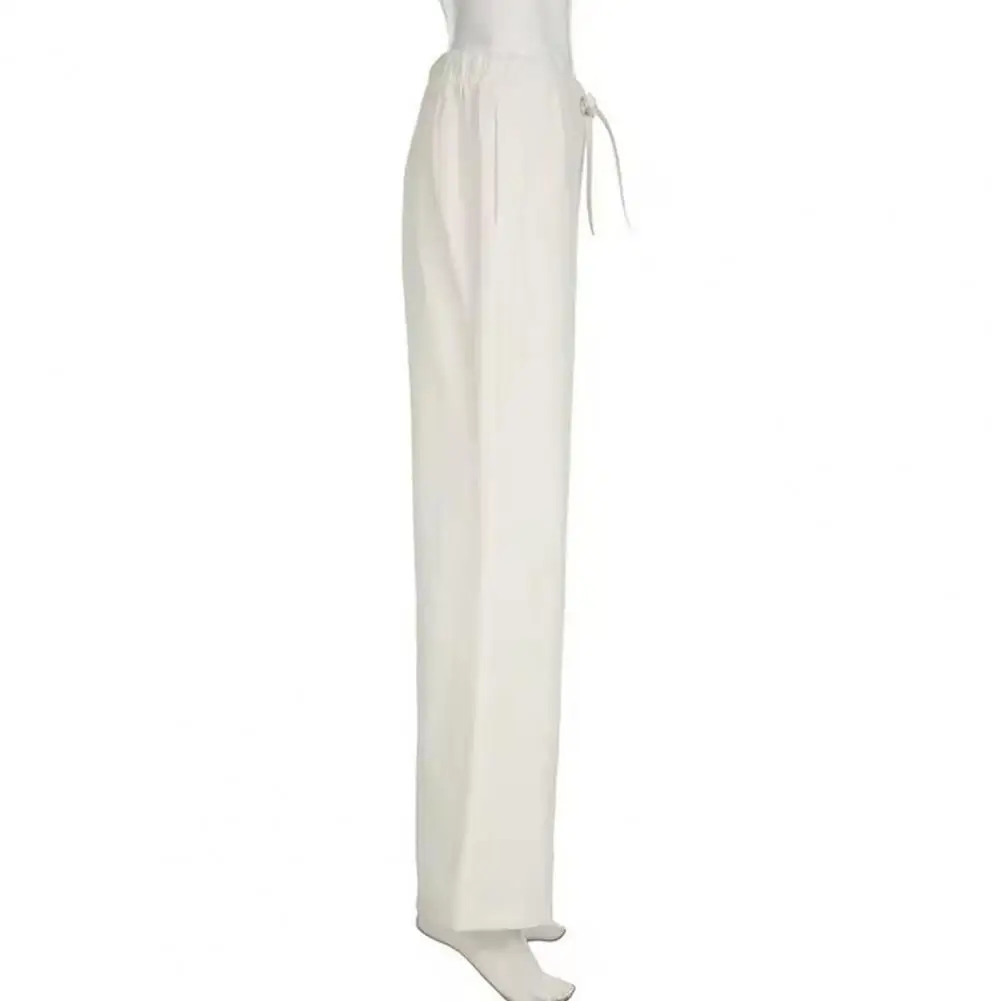 

Длинные брюки. Стильные женские шаровары с эластичной резинкой на талии. Широкие брюки с карманами для повседневной одежды для отдыха. Однотонные.