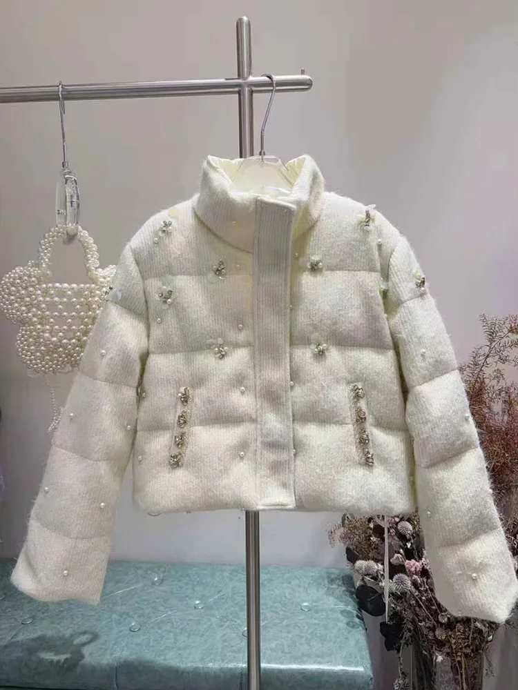 Рисунок 3 - Женские зимние новые модные пуховые пальто 202