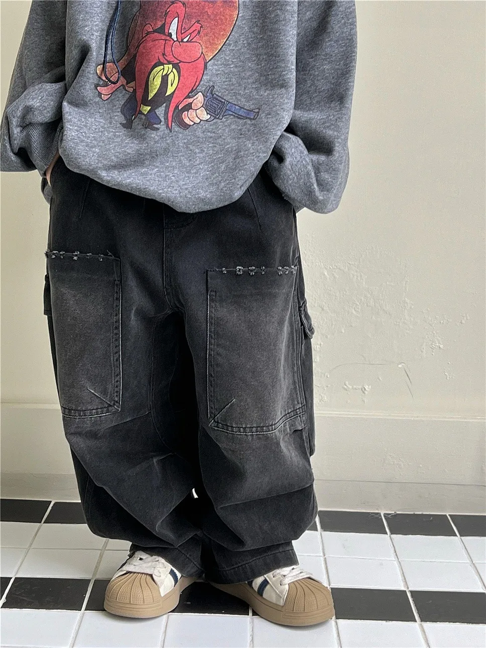 

2025 Autumn style children's clothing with large pockets and micro tapered worn-out distressed style children's and boys' denim