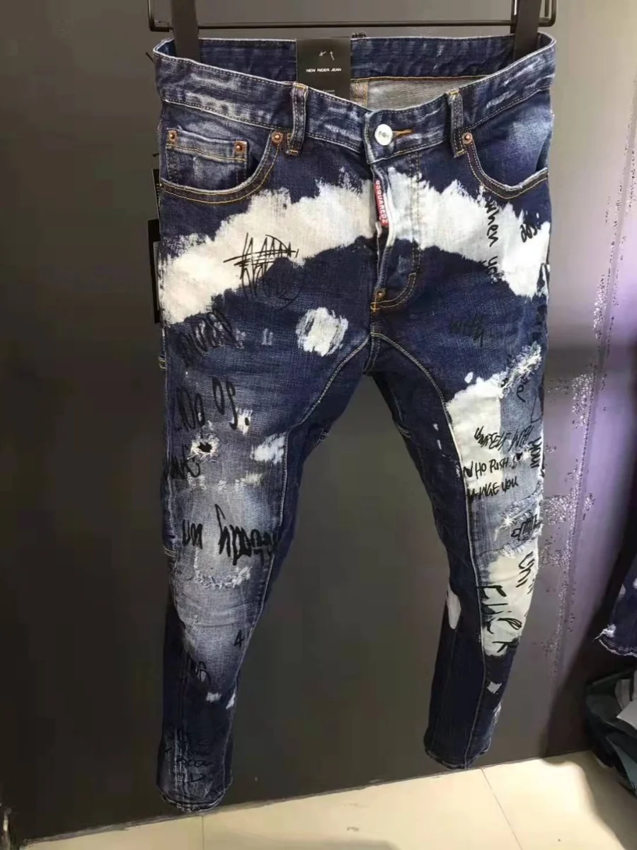 جينز رجالي عصري لربيع وصيف 2025 بتصميم ممزق وطباعة جرافيتي ثلاثية الأبعاد ضيق ومرن عند الكاحل للأعمال والملابس الكاجوال