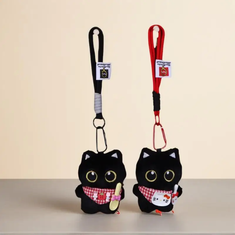 Nowatorski wzór dla par: Breloczek z pluszową figurką czarnego kota do kluczyków samochodowych i akcesoriów do torebek.