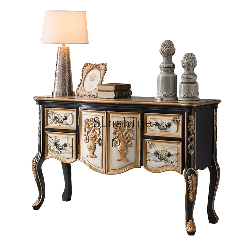 

The back of the sofa against the wall is decorated with a European retro solid wood entrance platform