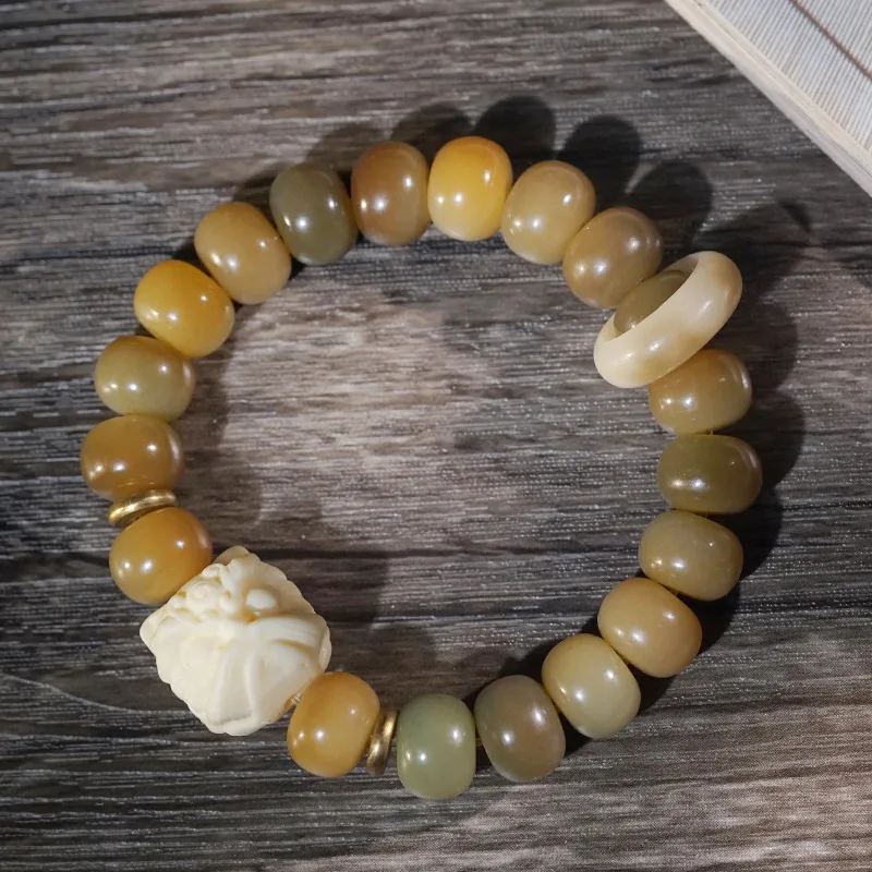 

Natural Weathered Bodhi Root Ivory Nut Lion Dance Bracelet Handheld Collectible Around Finger Soft Jewelry Ornament