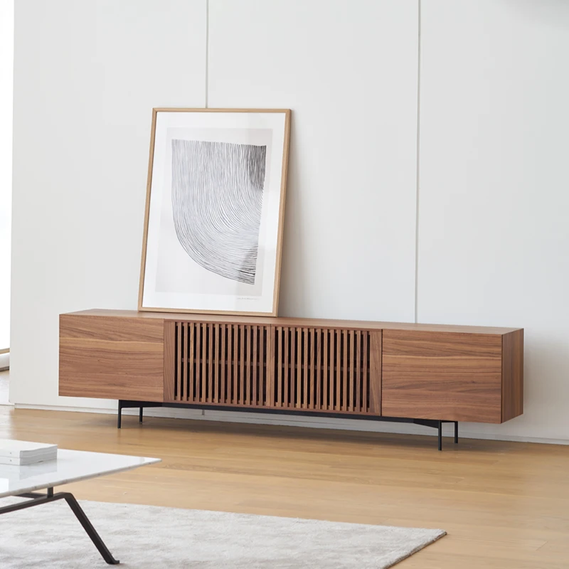 Modern and minimalist solid wood TV cabinet with opposite grid doors on the floor