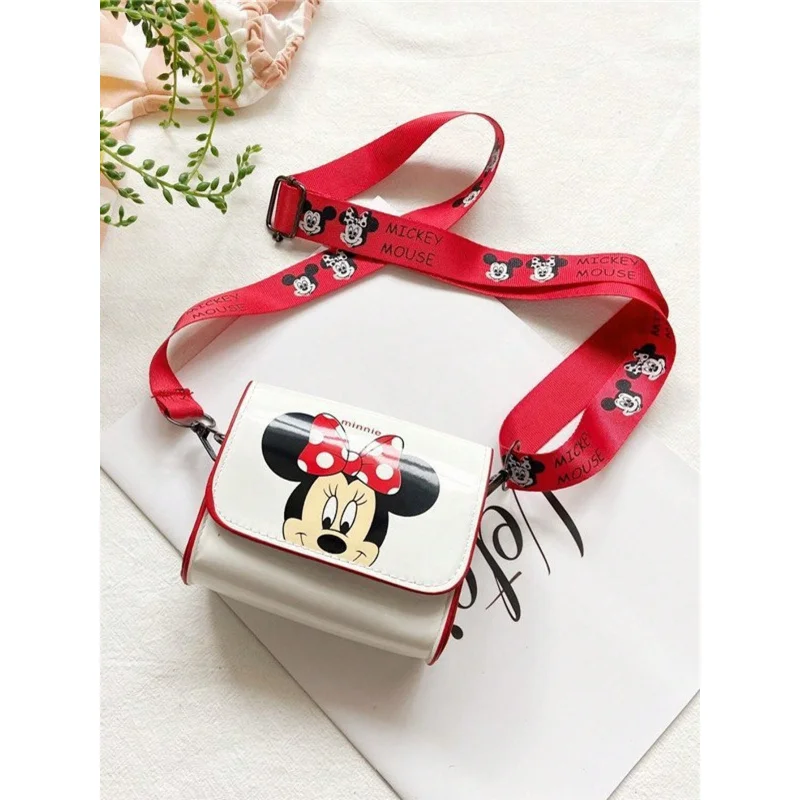 

Сумка через плечо Disney Minnie Stitch – милая сумка через плечо с мультяшным рисунком и регулируемым ремешком.