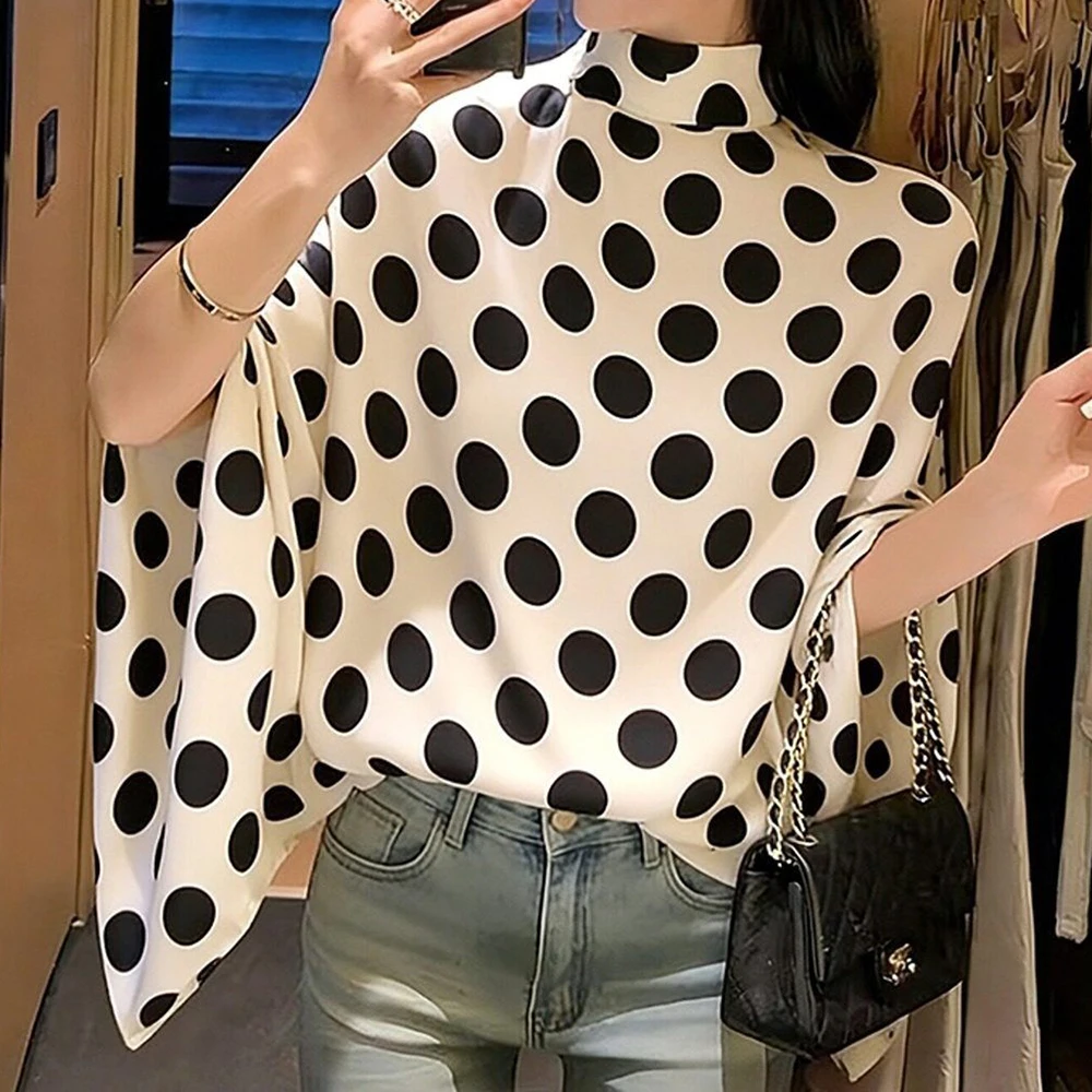 Light luxury niche does not collide with unique and beautiful white polka dot shirt 2026 spring new French petty top women