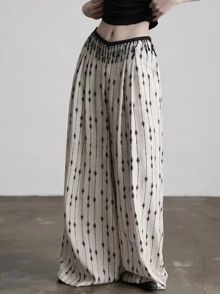 

Летние свободные широкие брюки для женщин, тонкие повседневные брюки в пол с цветочным принтом, с цепочкой на талии, в стиле Lazy Style Rouje Kefss