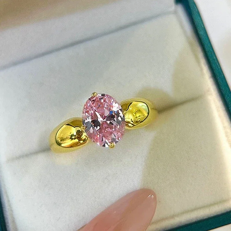 Huitan Süße Ovale Rosa CZ Ringe für Frauen Luxus Gold Farbe Engagement Zubehör Temperament Weibliche Ringe Erklärung Schmuck