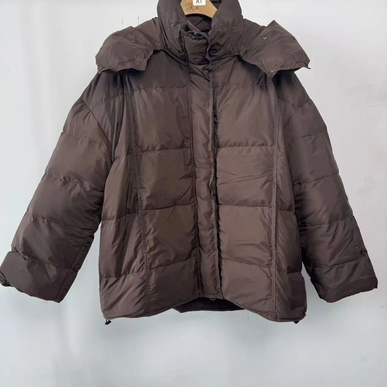 ヨーロッパの冬ホワイトダックダウン新しい女性のダウンジャケットルーズフード付き通勤特大ダウンジャケット