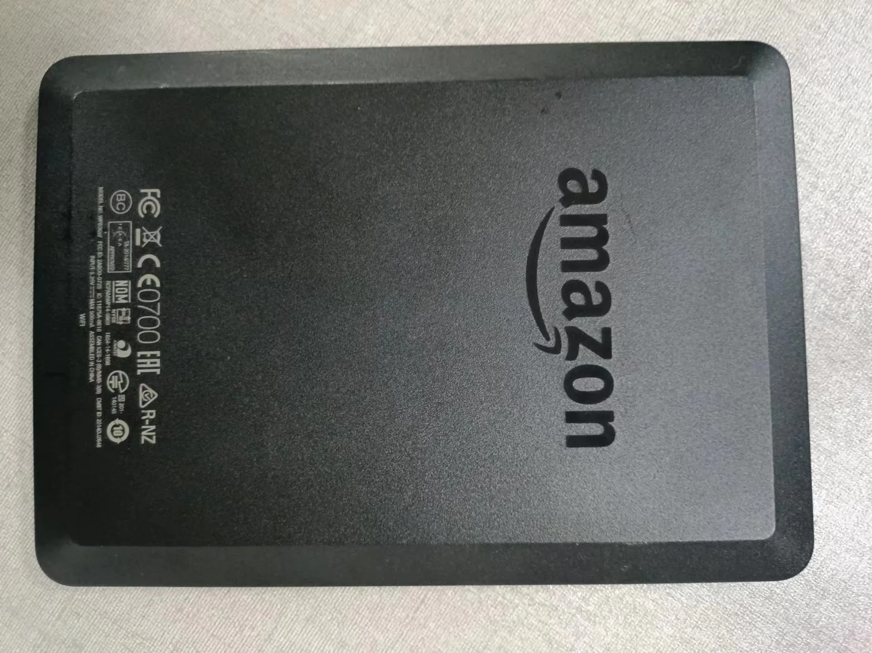 قارئ الكتب الإلكترونية Kindle 7th مستعمل بشاشة حبر إلكترونية غير خلفية مقاس 6 بوصات مع تسجيل الحسابات، واتصال Wi-Fi ولغات متعددة