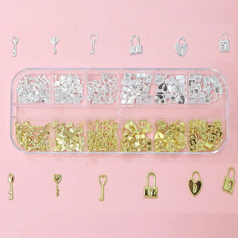 12 siatek złoty srebrny metalowy zamek kluczowe zawieszki do paznokci 3D Bowknot/serce miłosne/kwiaty Nail Art Rhinestone Manicure rozgwiazda łuk nity