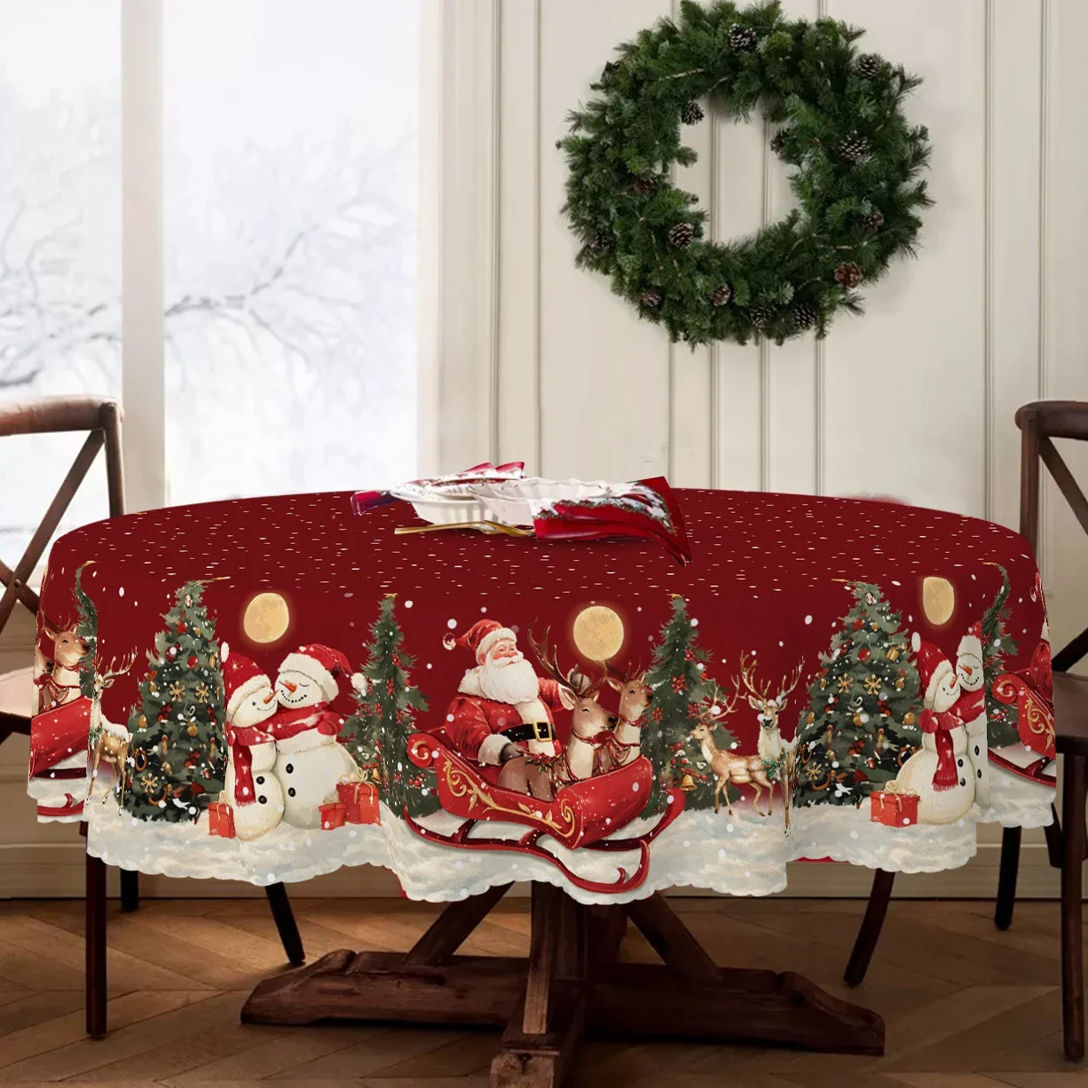One item: A modern-style Christmas tablecloth featuring a red Santa Claus, a snowman, and reindeer.zyc