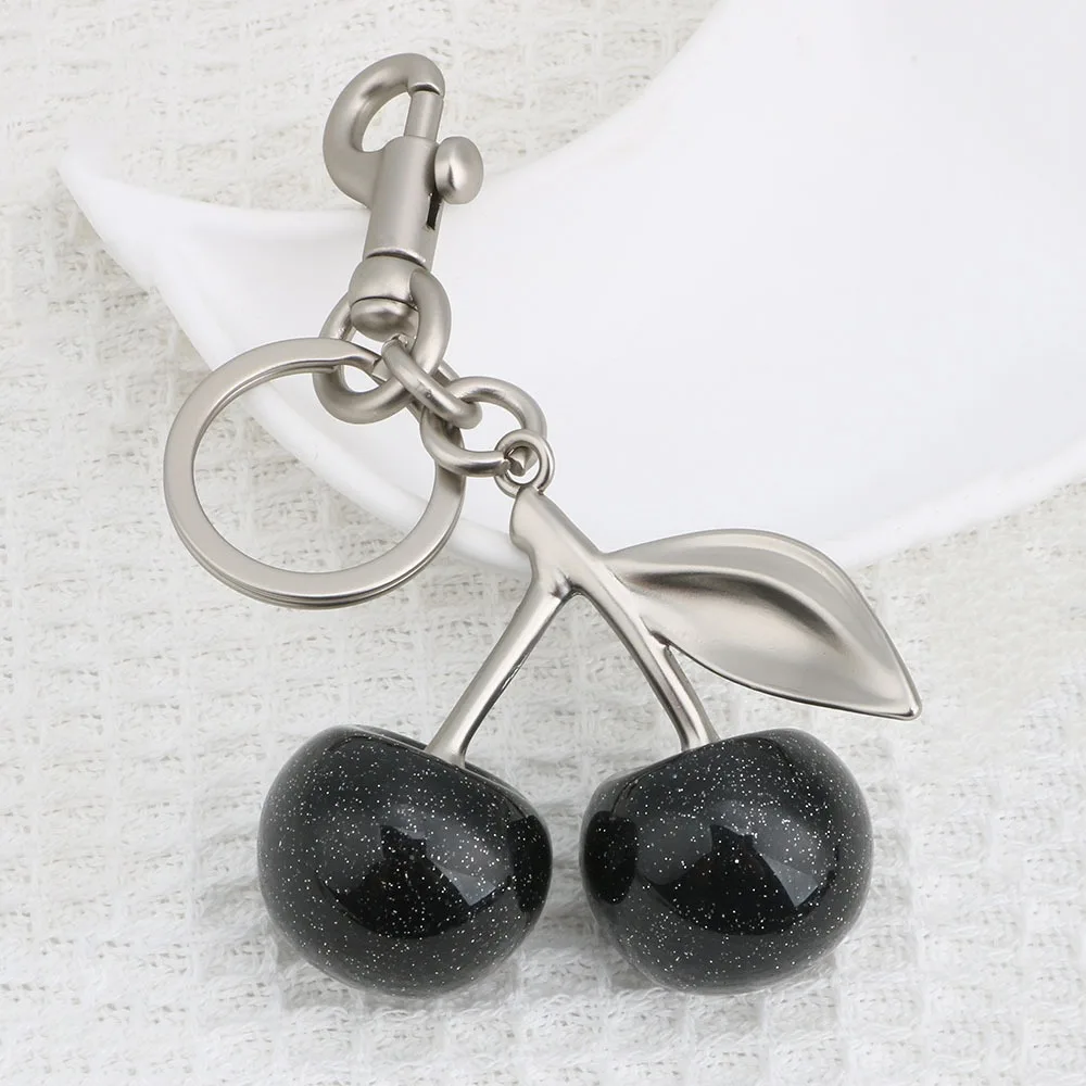 Porte-clés de voiture noir pour hommes et femmes, breloques de sac de voyage, pendentif cerises d'été, accessoires de porte-clés, cadeaux de bijoux, aucun