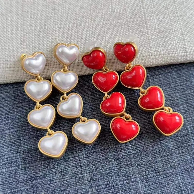 

Oscar European and American Fashion Trends Niche New Sweet, Fresh and Cute Three-dimensional Double-sided Love Stud Earrings