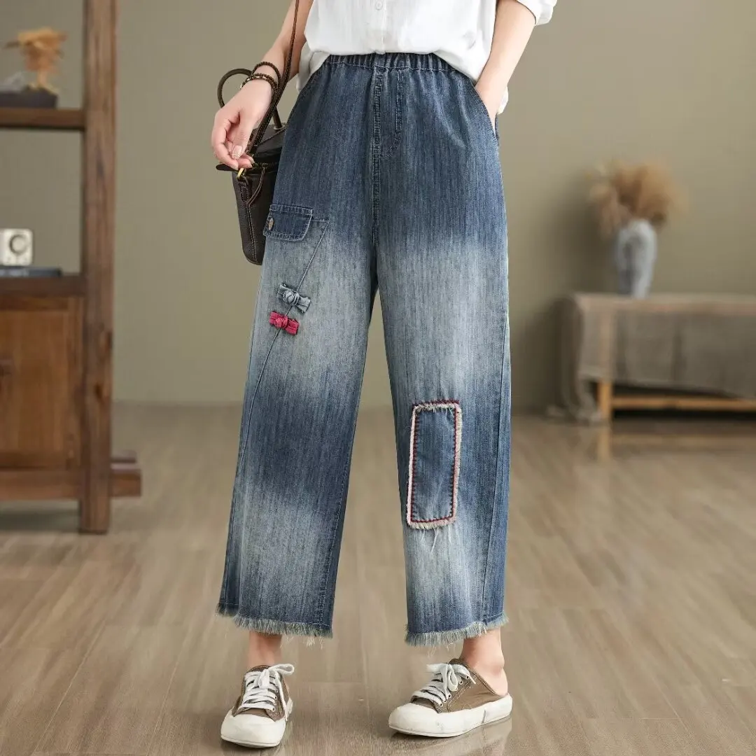Aricaca กางเกงเอวสูงสำหรับผู้หญิงกางเกงขาบานดีไซน์ปักลาย M-2XL กางเกงยีนส์แฟชั่น