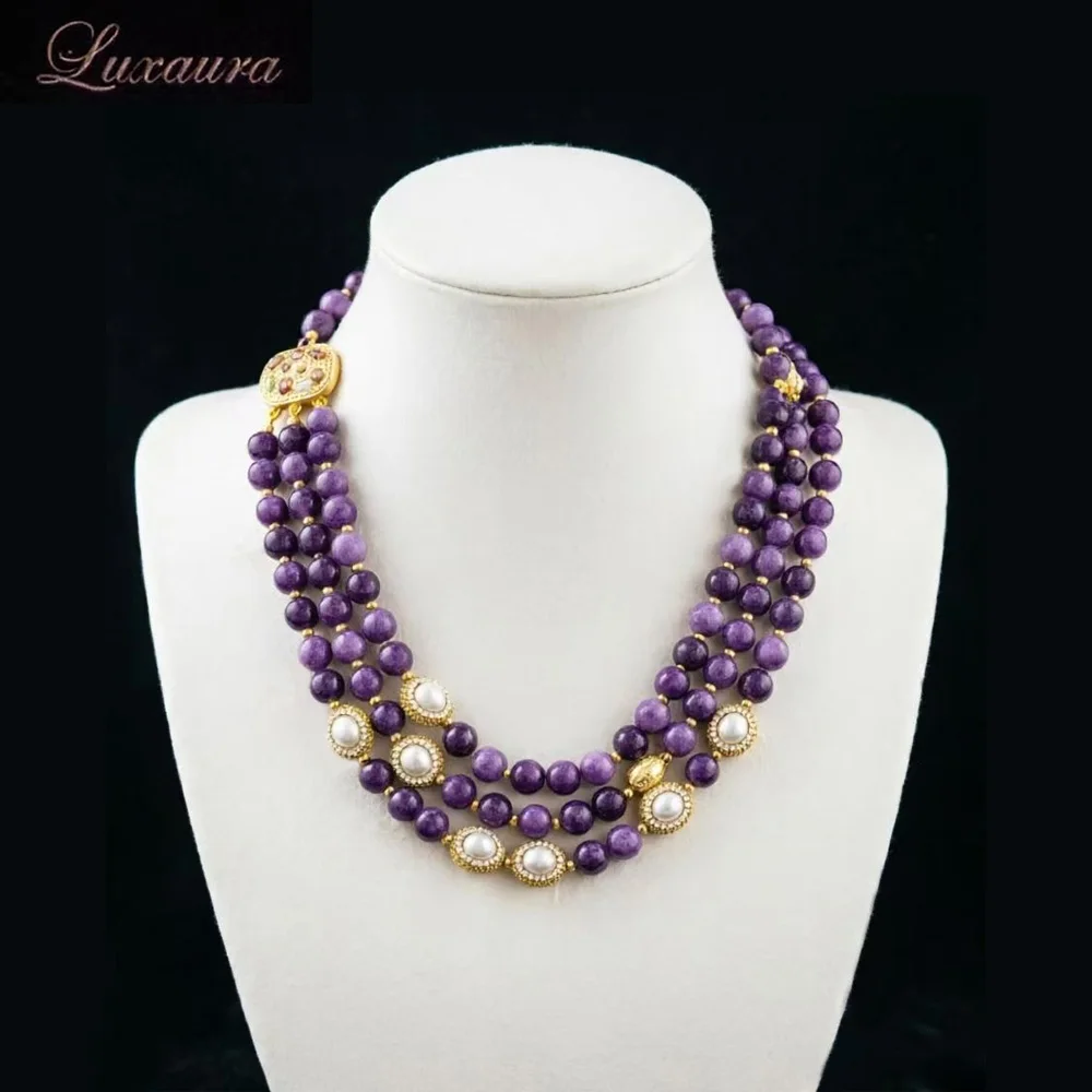 

Vintage jewelry featuring a fashionable and classic purple geometric necklace design paired with Bohemian style women's necklace