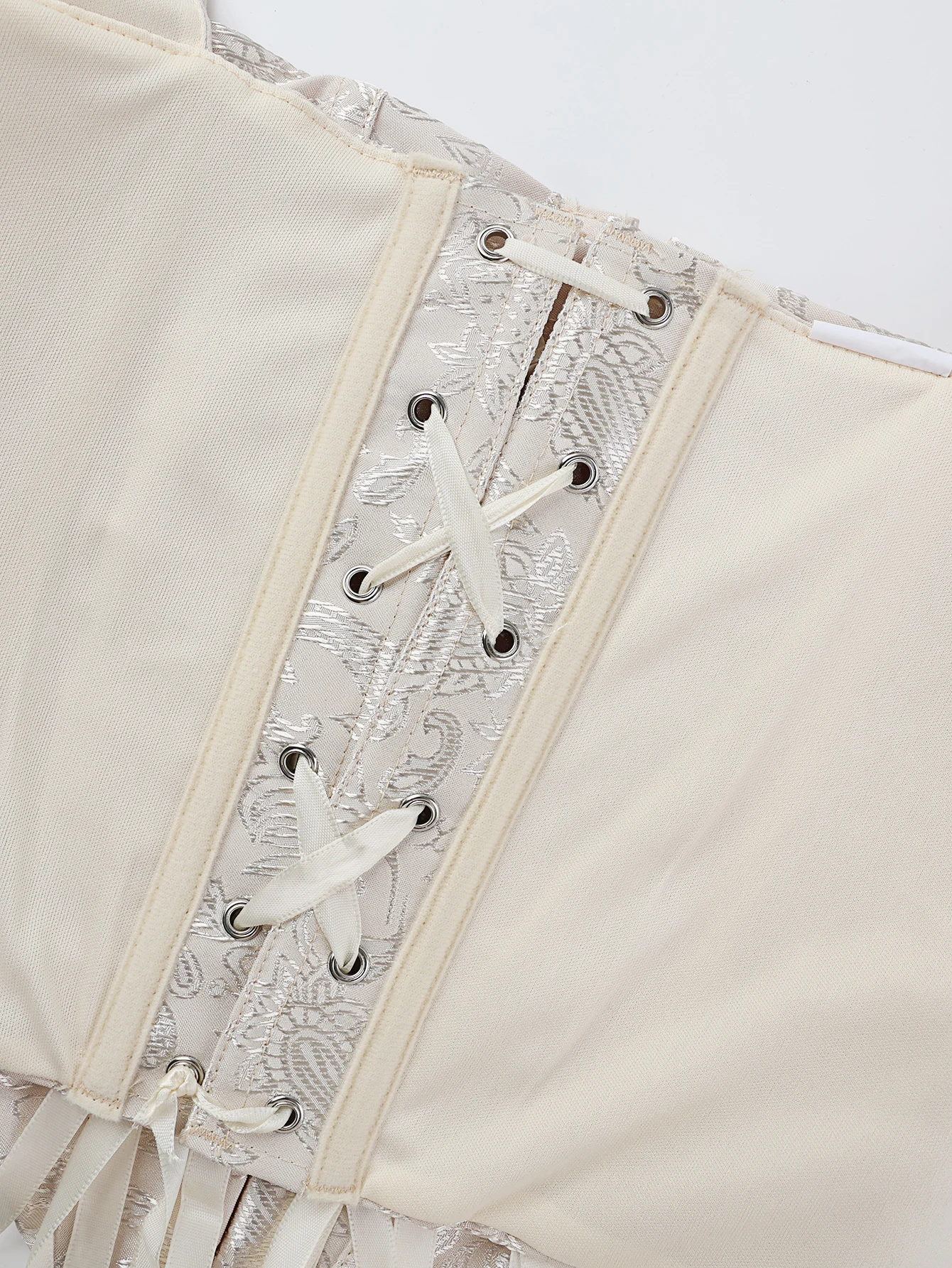 مشد الخصر بأزرار للصف الأمامي للنساء هو تشكيل الجزء العلوي