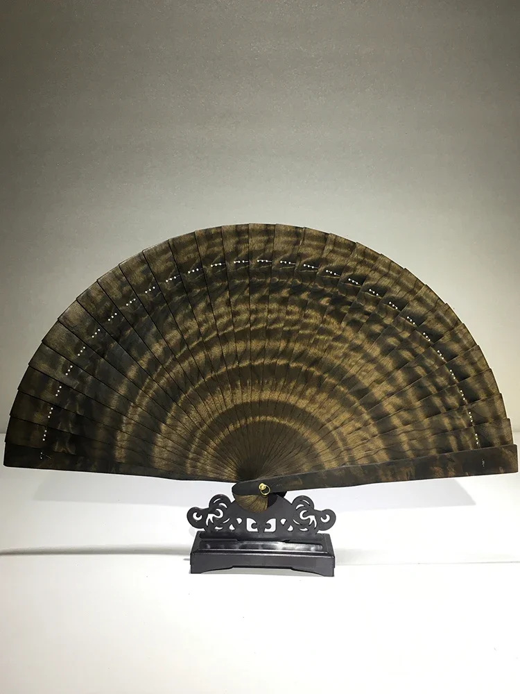 

Gloomy golden nanmu fan Chinese style hollow ebony folding fan