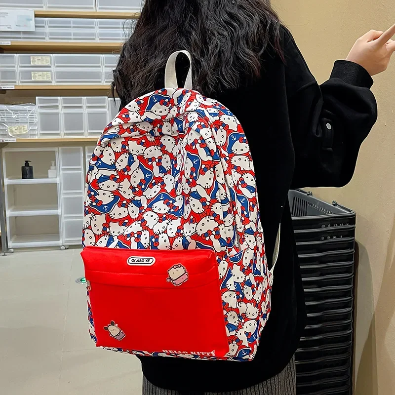 Sanrio Hello Kitty Niedliche Kontrastfarbe, leicht, für Studenten, Schultasche, Trend, Reisen, vielseitig, lässig, roter Rucksack für Damen