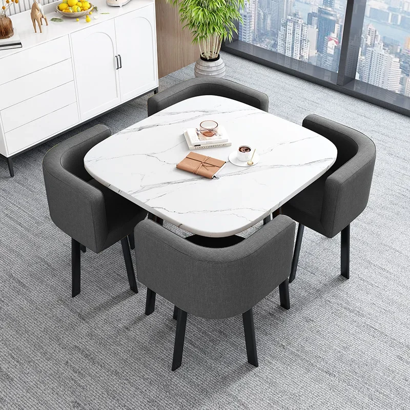 مكتب استقبال واجهة المتجر وكرسي الاستقبال وطاولة مستديرة صغيرة