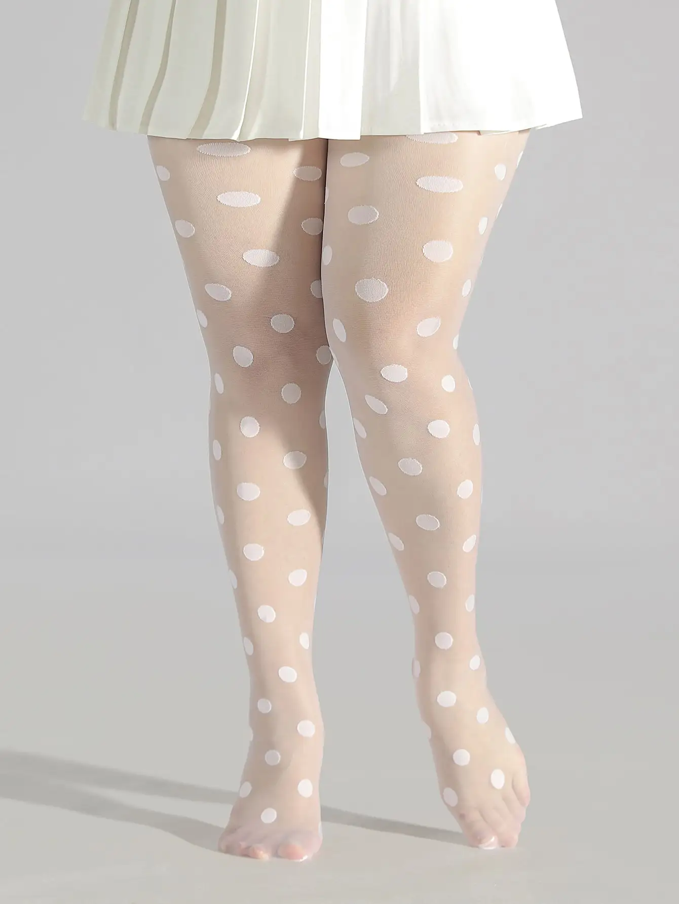 

A classic white polka dot jacquard oversized stockings