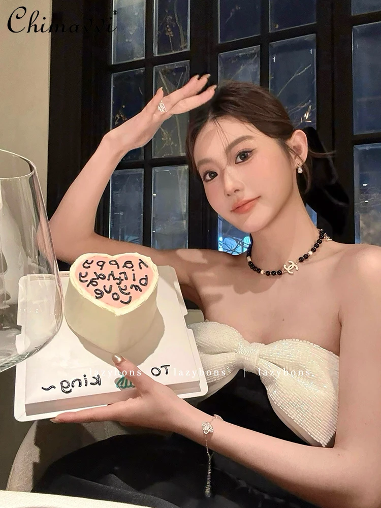 チューブトップドレスエレガント社交家の誕生日ドレスファッション黒と白の対照的な色ビーズリボンふわふわ振り子ドレス