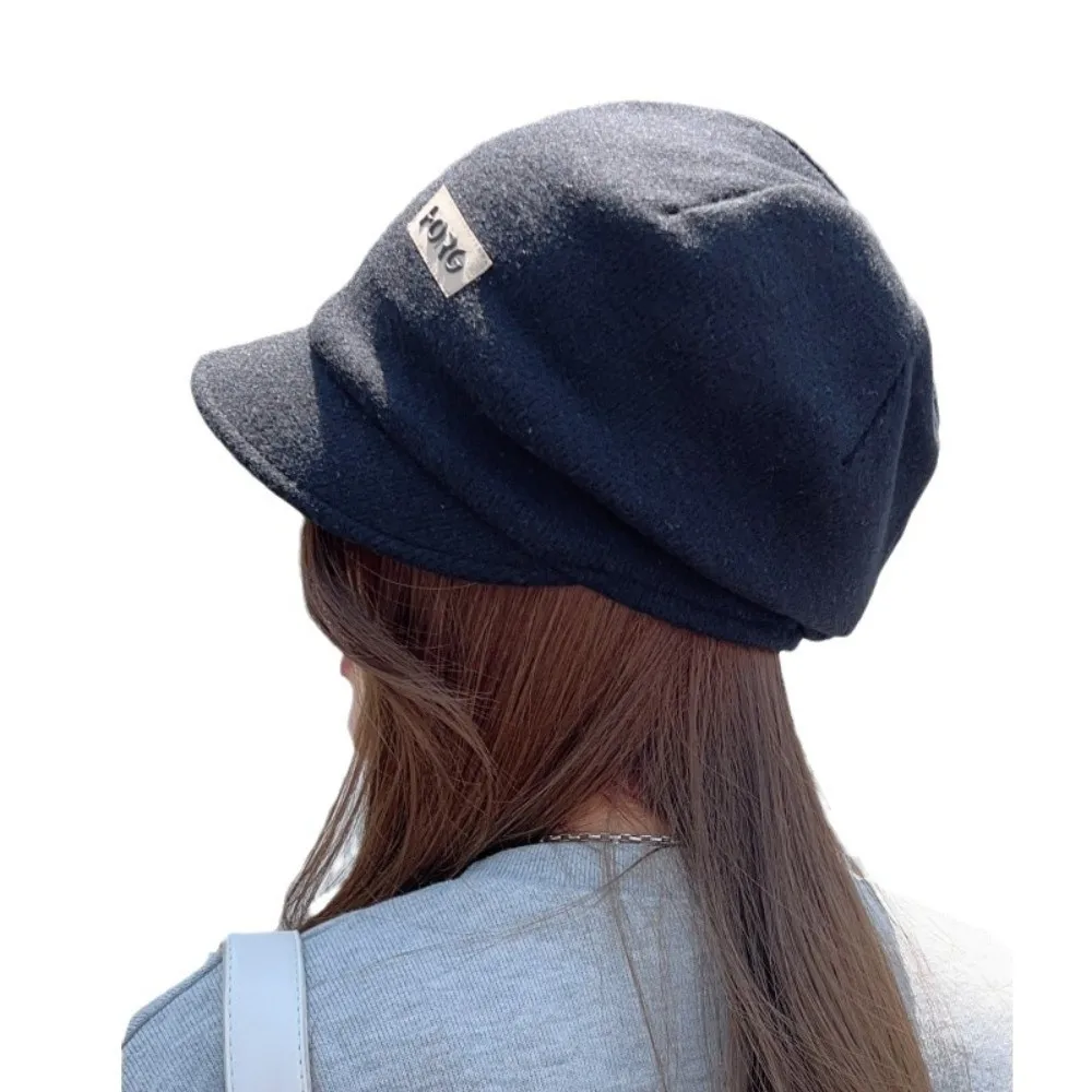Topi baseball wanita dengan pinggiran lebar, warna solid, tebal, tahan angin, dan hangat.