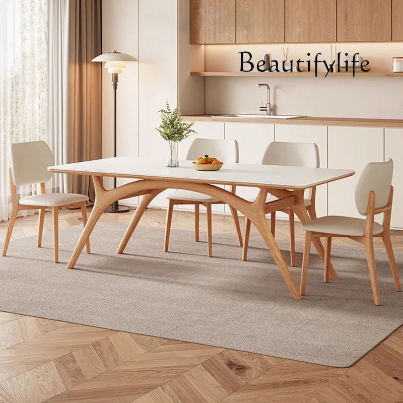 

Nordic solid wood rock slab dining table household small apartment modern light luxury simple rectangular cream style dining tab
