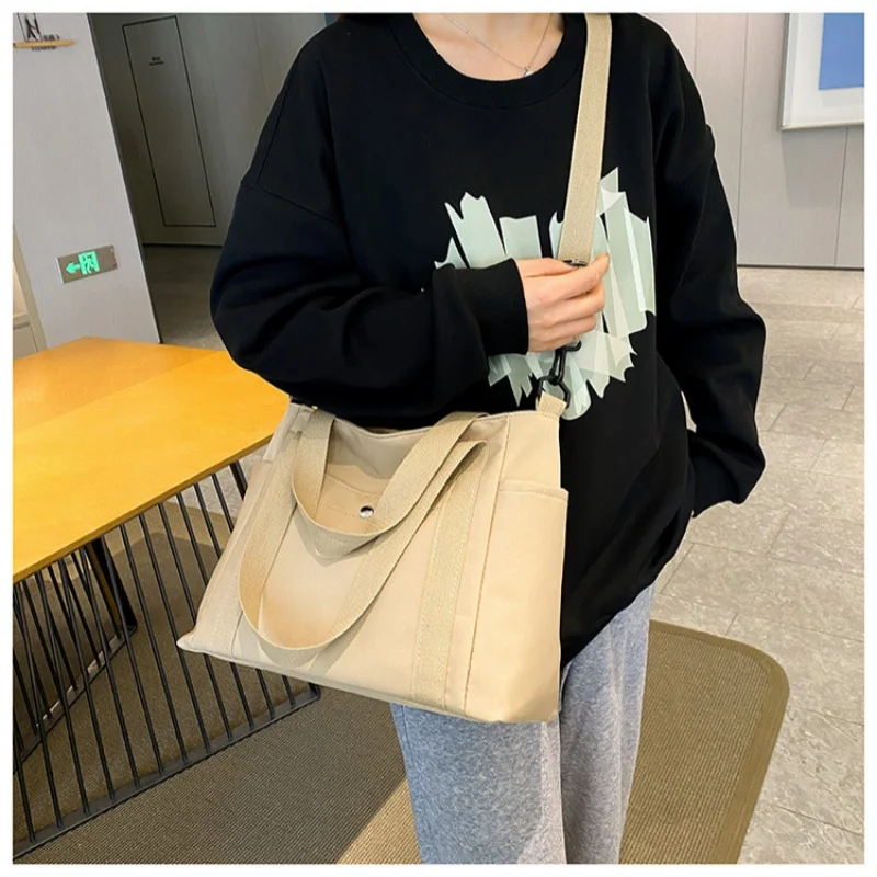

New large capacity canvas crossbody bag casual solid color crossbody bag, versatile single shoulder tote bag, work commuting bag