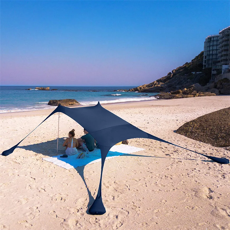 

Factory Price Sunshade Pop up Beach Tent Sun Shade with Sandbag Anchors and Pegs UPF 50+ Light Beach Sun Shelter Canopy Tent