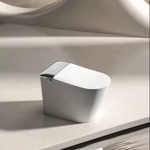Inteligentne siedzisko toaletowe JM810L z kontrolą, nieskończone ciśnienie wody, inteligentny dodatek łazienkowy, odpływ S-trap, podgrzewane siedzisko.