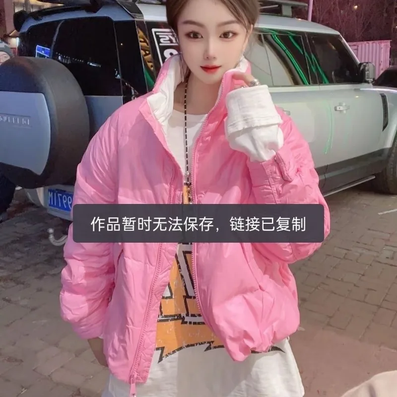 Kurtka puchowa odmładzająca, krótka, zimowa, ze stójką, lekka, z rękawami ze sznurkiem, modny design, wysoki poziom estetyczny.