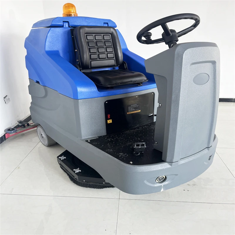 Macchina industriale per asciugatrice per pavimenti Ride-On per la pulizia della superficie del calcestruzzo della macchina per la pulizia del pavimento di grandi magazzini
