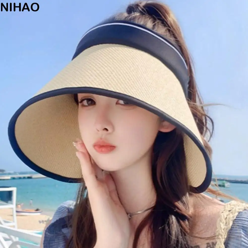 

Trendy Foldable Woven Empty Top Cap UV Protection Bow Wide Brim Bucket Hat Visor Hat Straw Plaited Hollow Straw Hat Seaside