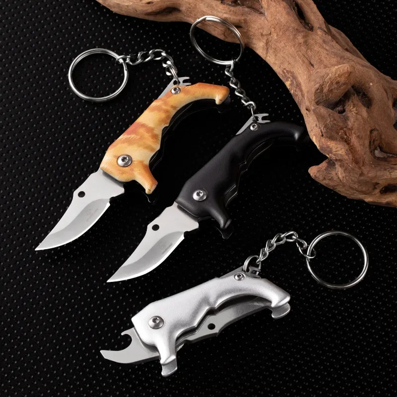 Mini cuchillo de autodefensa de bolsillo al aire libre, cuchillo plegable multifuncional portátil, llavero colgante creativo en forma de perro