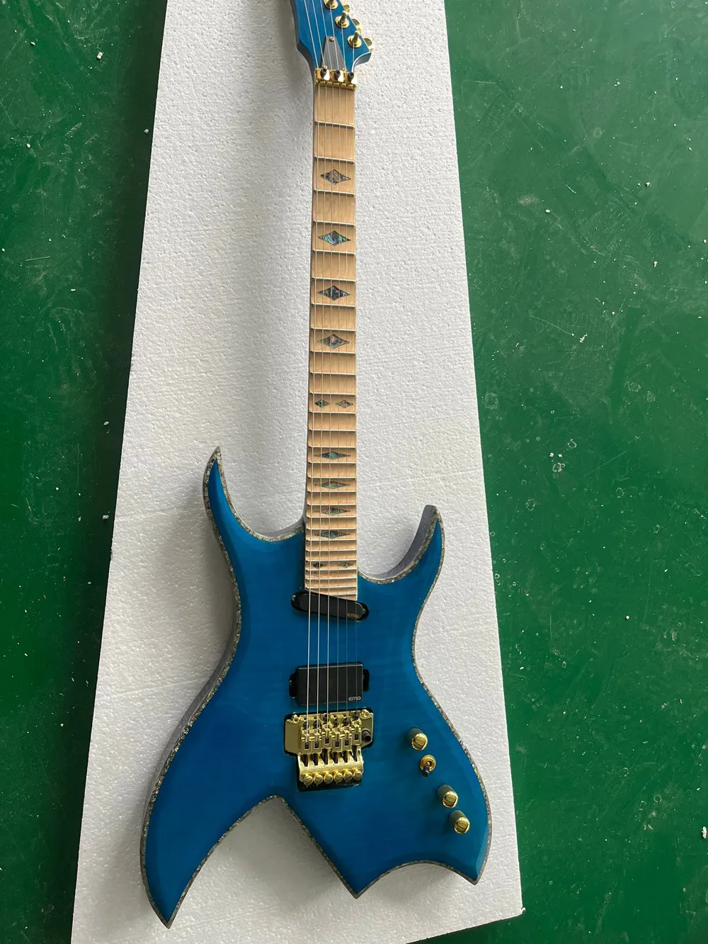 

Blue Body Electric Guitar with Flame Maple Top Scalloped Fretboard,Stainless steel frets,Provide customized service