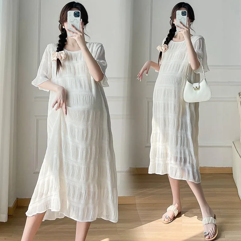 

Trending Now: Summer Maternity Dress with Unique Texture - Sweet Pleated Style in Apricot - Perfectly Loose for Comfort!