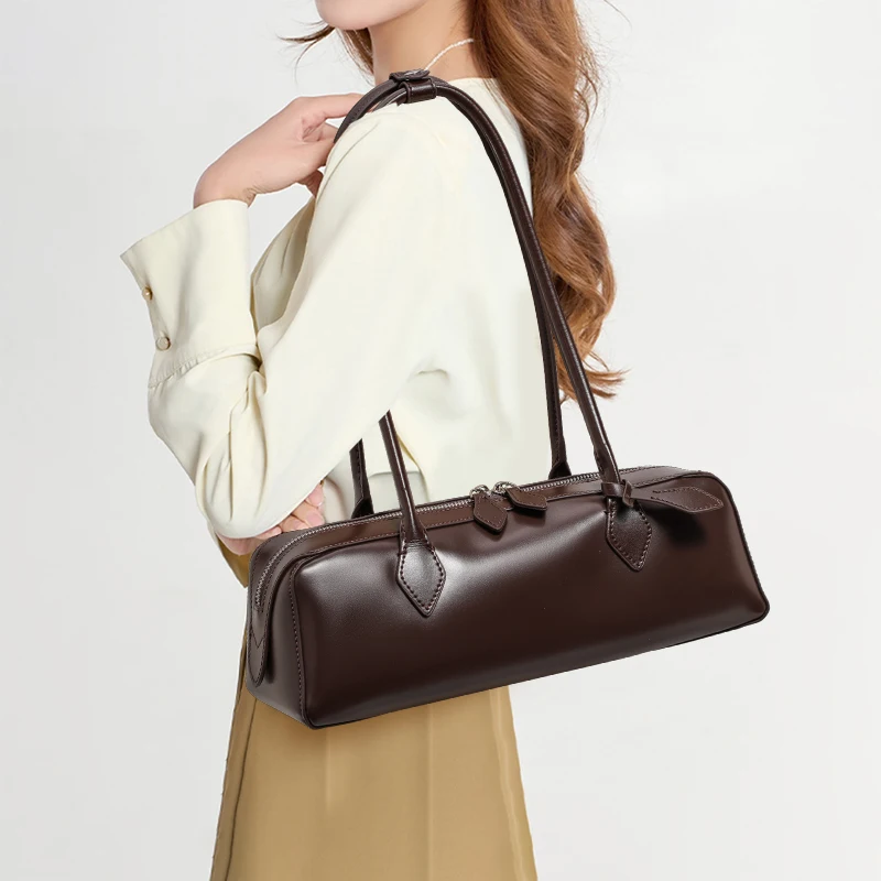 

Genuine leather cowhide women's shoulder bag stick-shaped long portable pillow bag underarm Handbag mobile phone bag purse