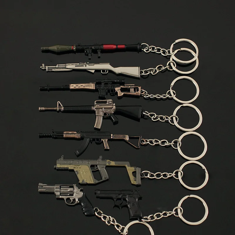 

Mini Gun Keychains Series RPG Bazooka Sand Eagle Revolver SVD Beretta Small Gun Pendant,Tactical Military-themed Keyrings