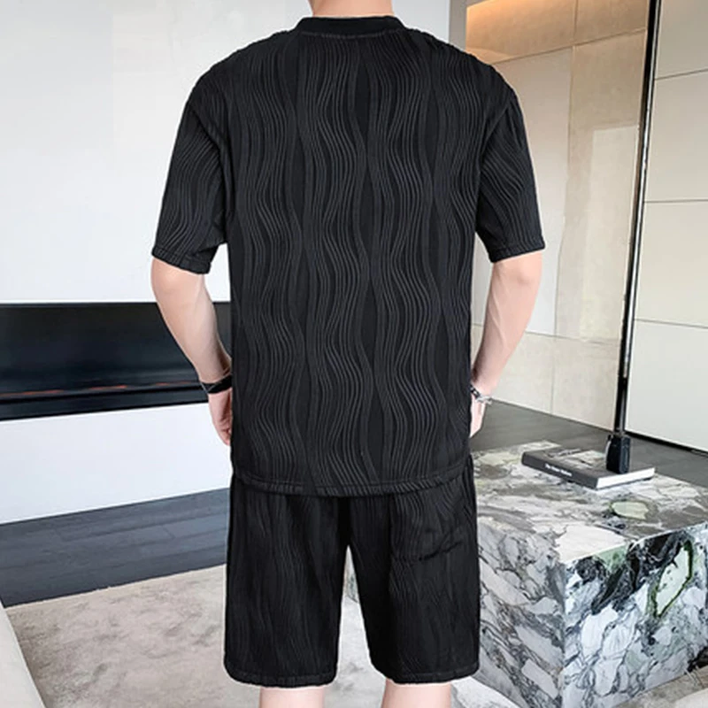 Sommer Herren weiß schwarz Set Mode lose Rundhals ausschnitt Kurzarm und Shorts Set 2 Stück Mann Trainings anzüge