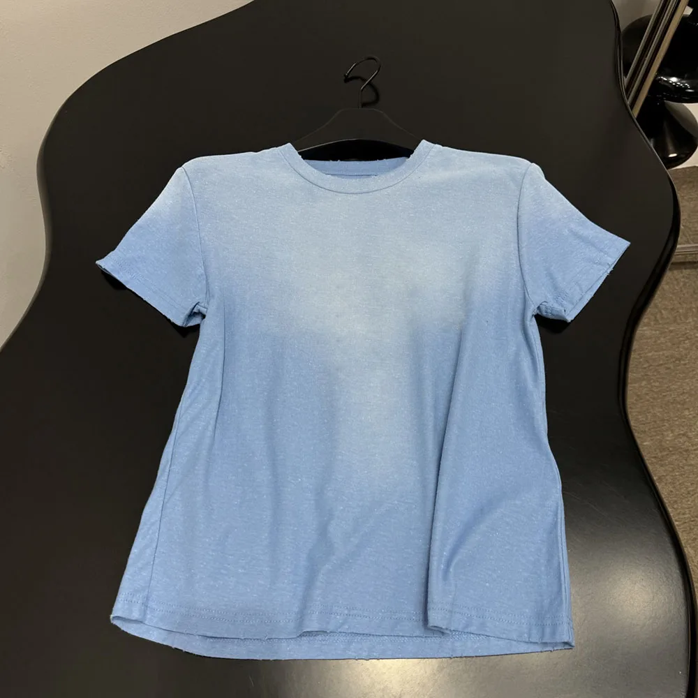 

High-quality 2026 women's round-neck short-sleeved T-shirt with retro distressed and worn-out design and gradient color xy150477