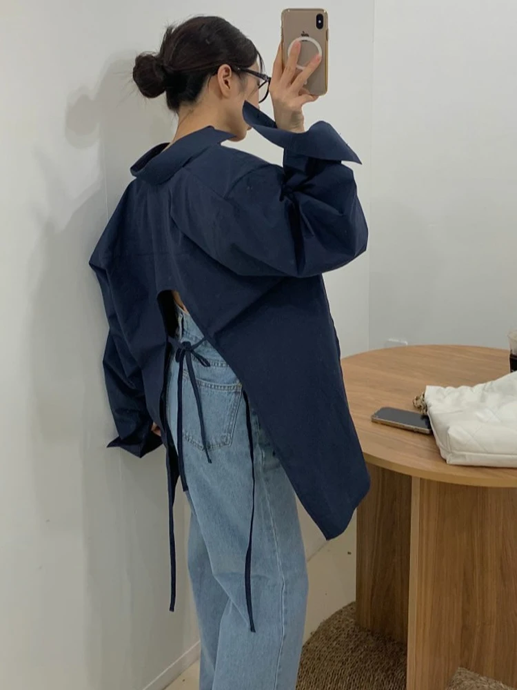 قميص نسائي أنيق فضفاض بدون ظهر بأكمام طويلة وياقة مقلوبة بتصميم كلاسيكي على الطراز الكوري لفصل الربيع المبكر