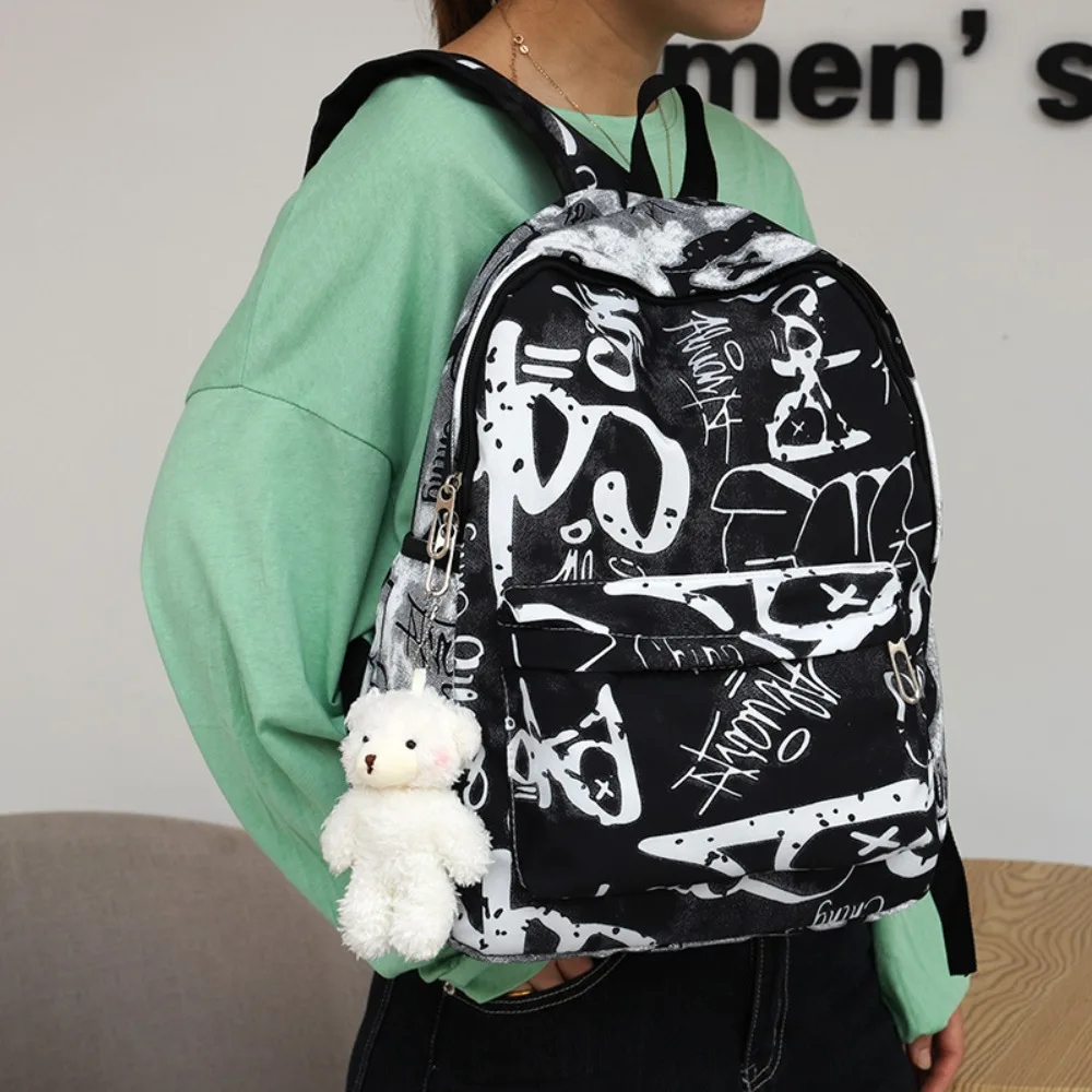 Sac à dos décontracté en nylon pour femme, grande capacité, sacs d'école étanches, sac initié par impression graffiti, étudiants