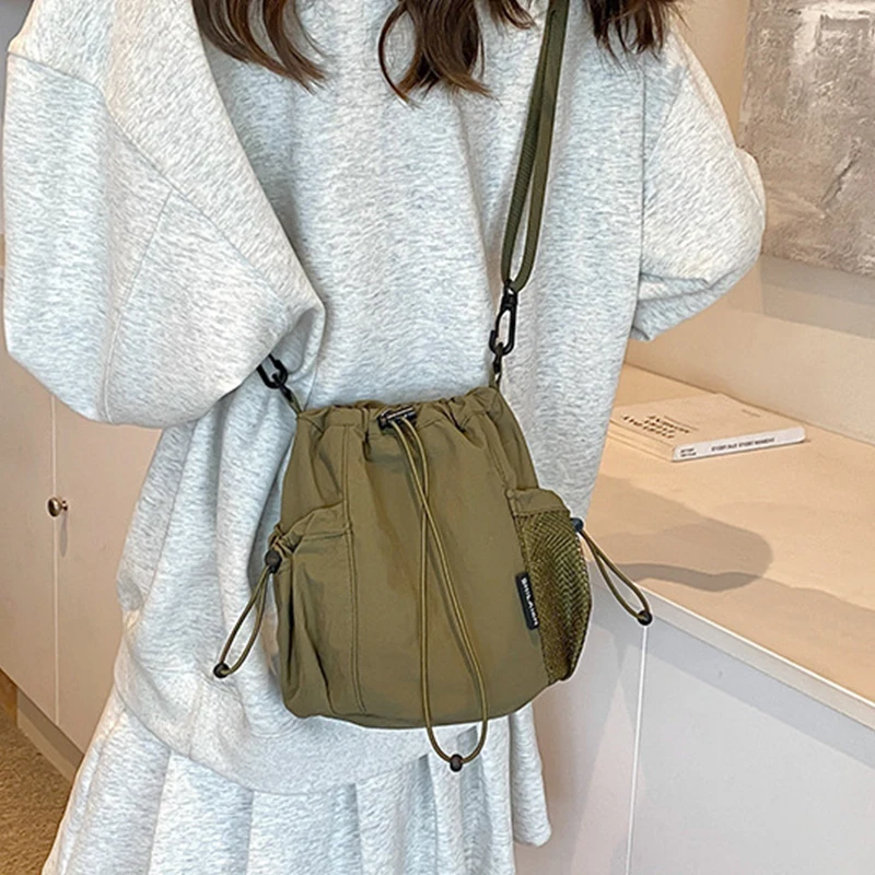 

Nylon drawstring pocket single-shoulder bag, simple and lightweight for going out, mobile phone bag, casual crossbody bag