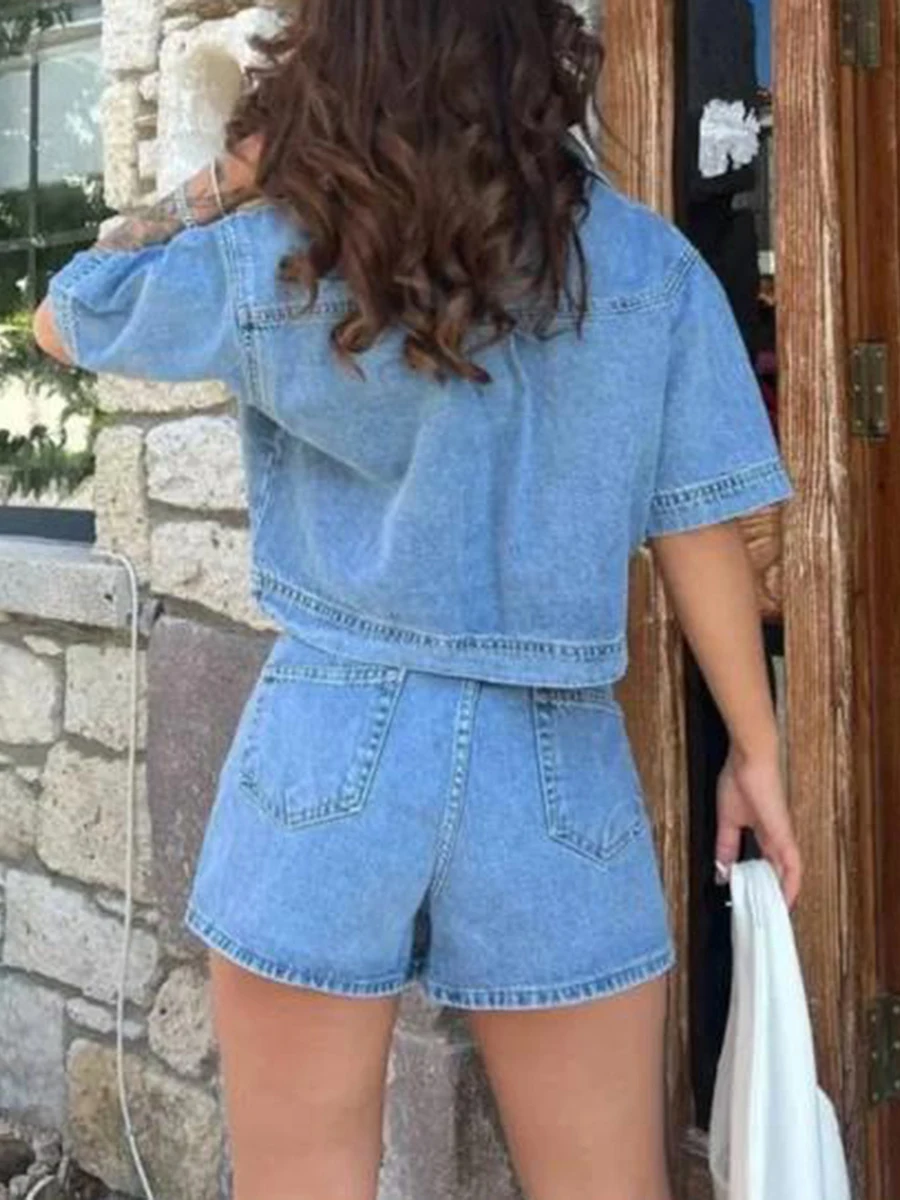 New Fashion Women 2 Piece Denim Outfits Short Sleeve Lapel Jean Tops And Asymmetrical Shorts Set Streetwear Hot Sale S-XL