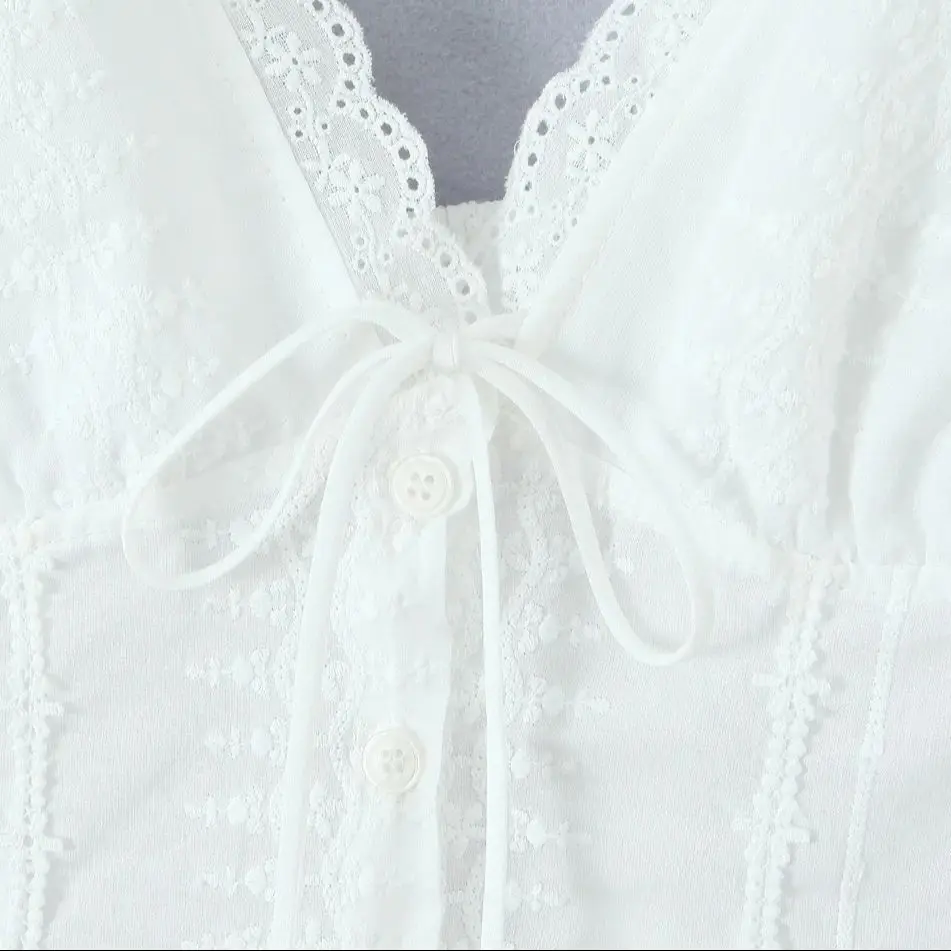 2025 White Embroidery Hollow Out Hole Splice Lace V neck Short Puff Sleeve Shirt Women Center Button Elastic Back Slim Crop Tops